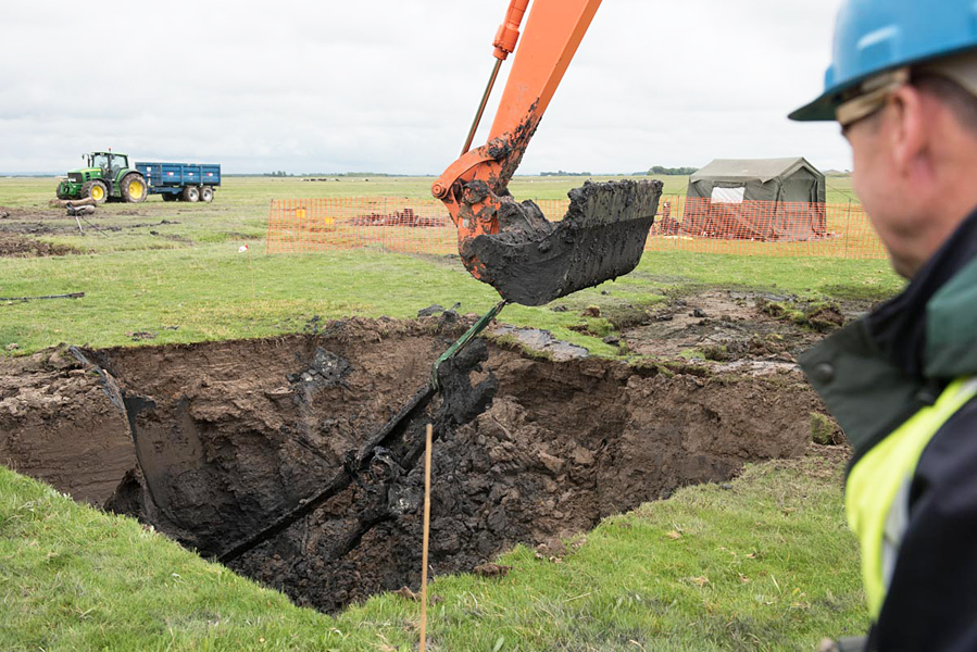 Wing spar section being recovered